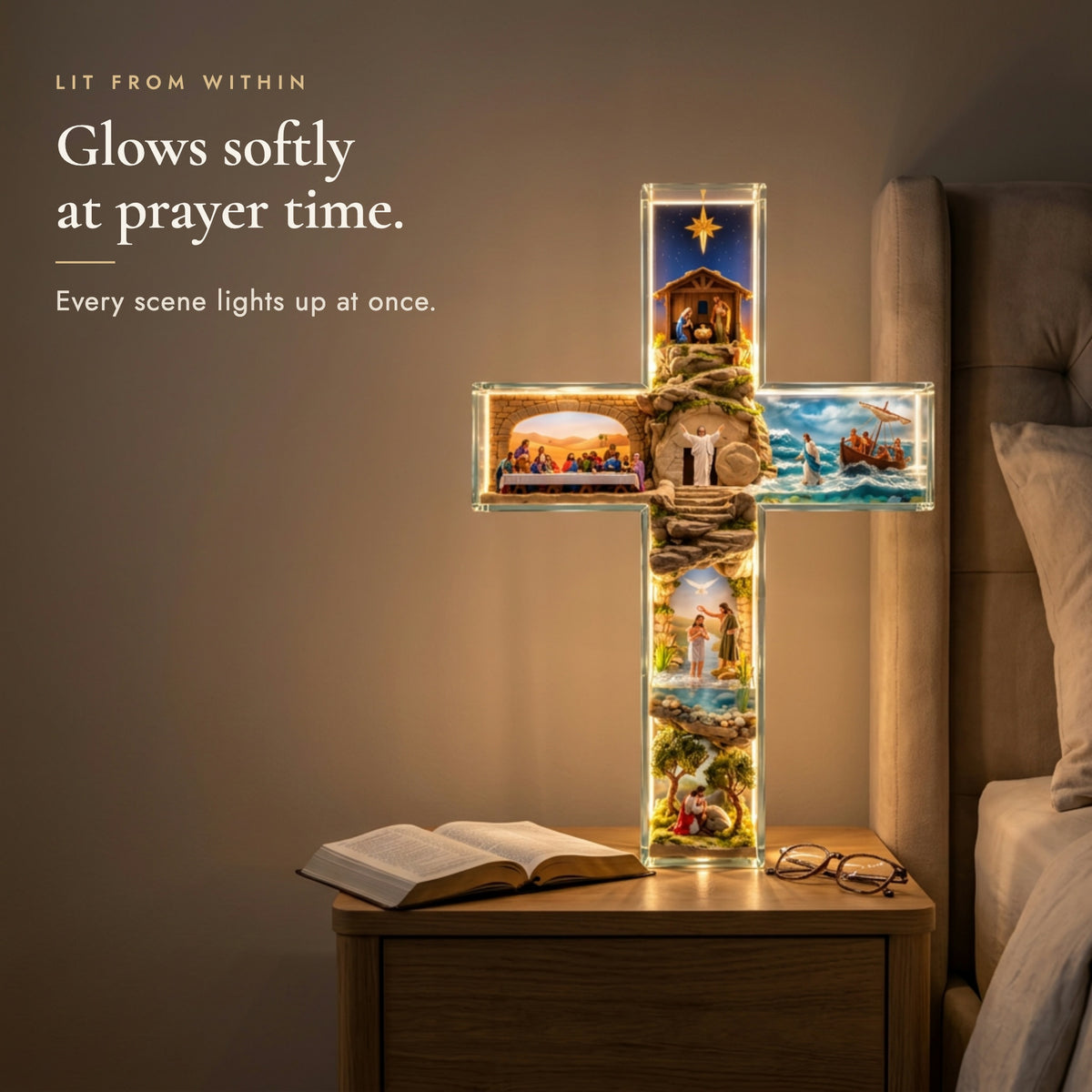 Light-up cross glowing softly on a nightstand beside an open Bible at night